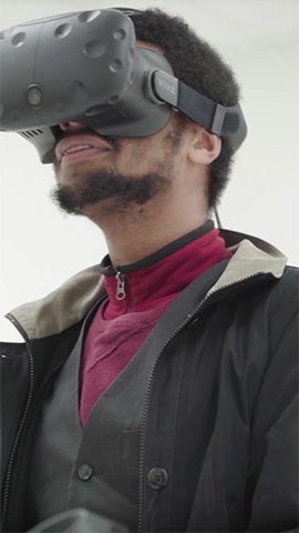 Devin Klibanow using a VR headset.