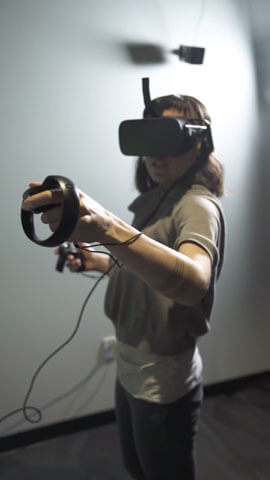 Mari Jaye Blanchard using a virtual reality unit.
