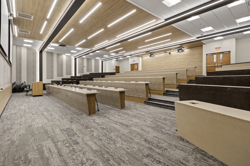 a modern auditorium with multi-level seating.