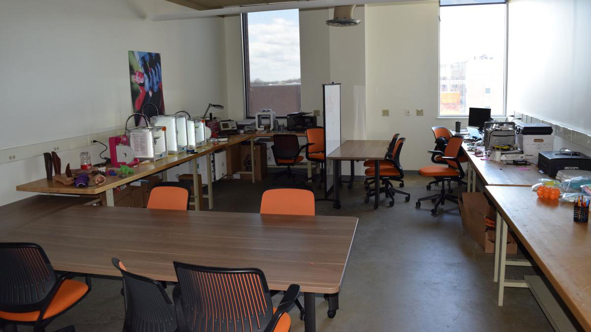 lab space with several tables and chairs