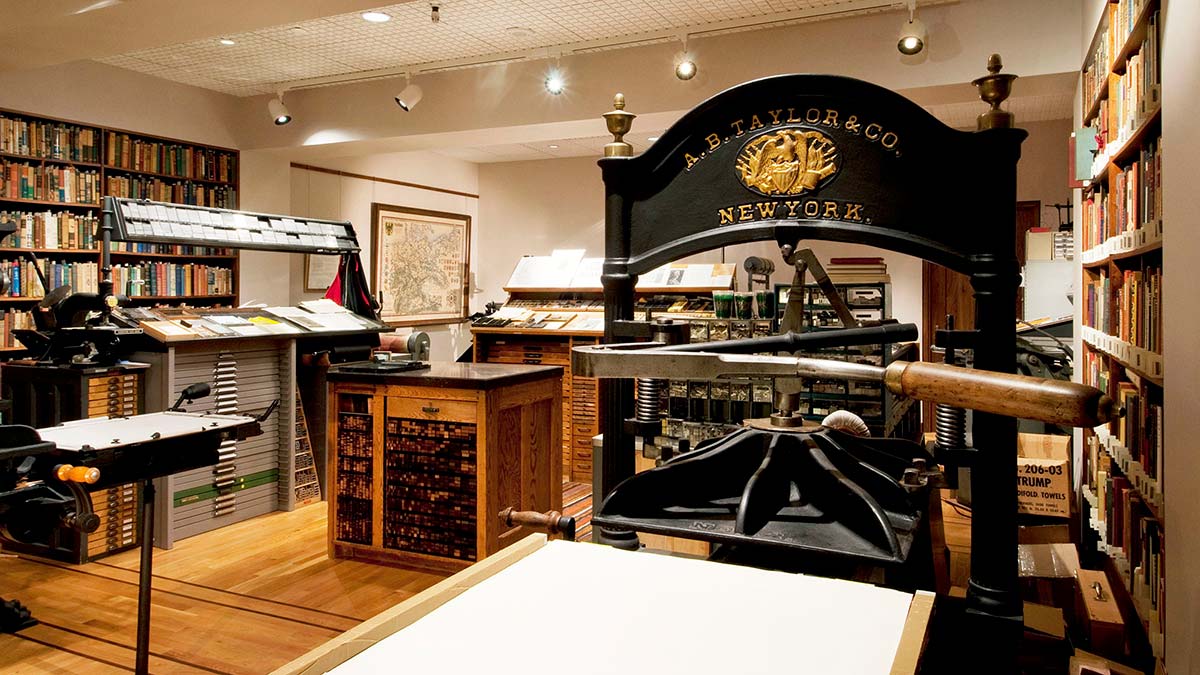 a room with antique printing presses.