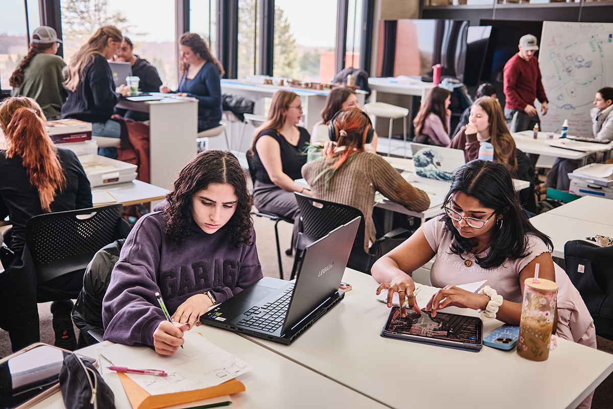 Students work in the interior design studio.