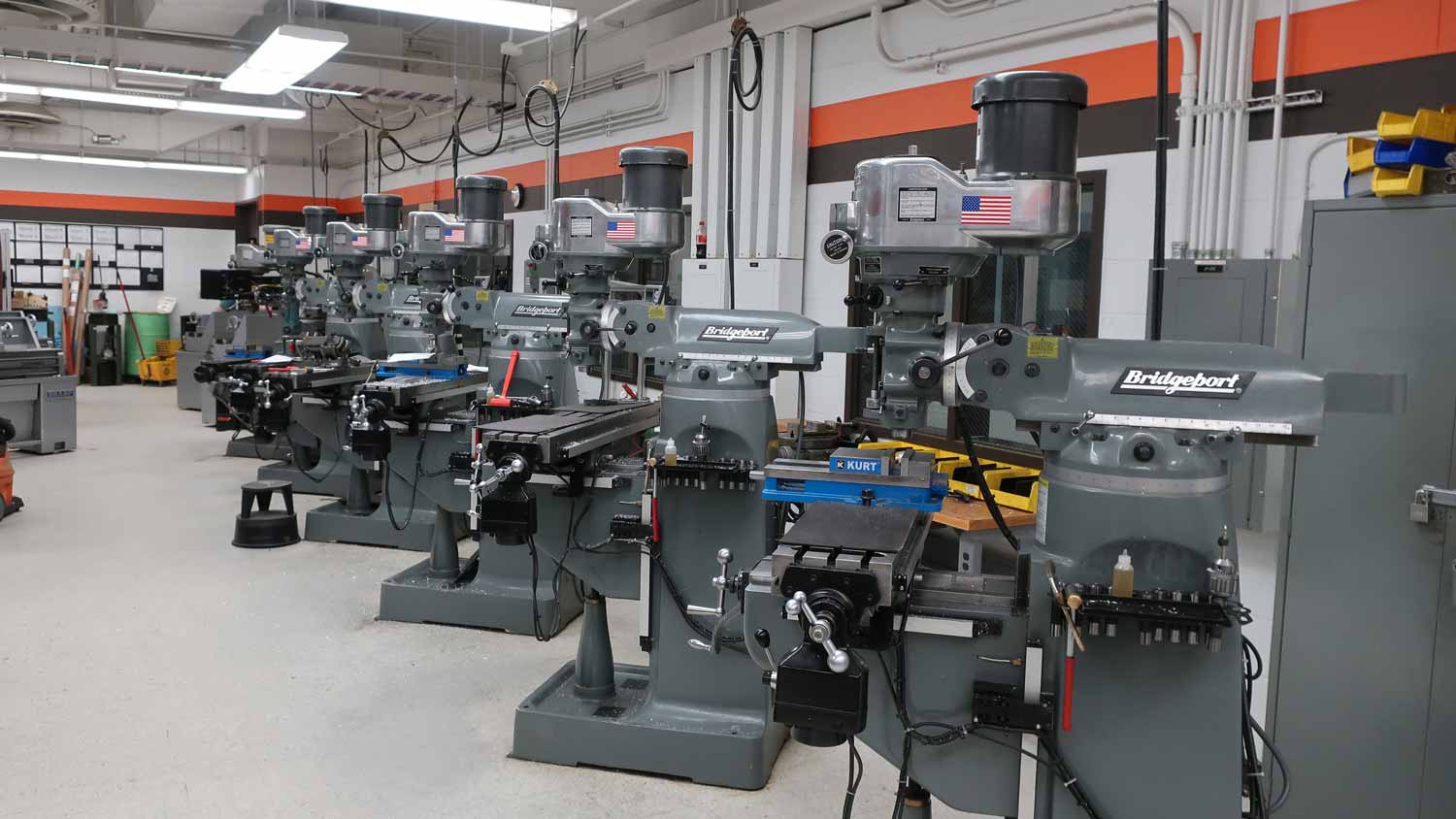 A row of machining tools in a workshop