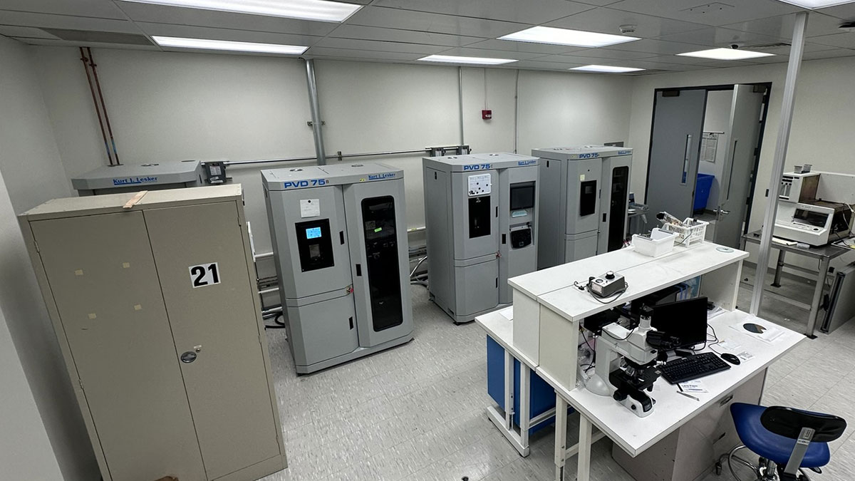 overhead view of lab with several tube furnaces.