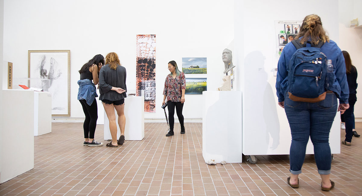Students view work in Bevier Gallery.