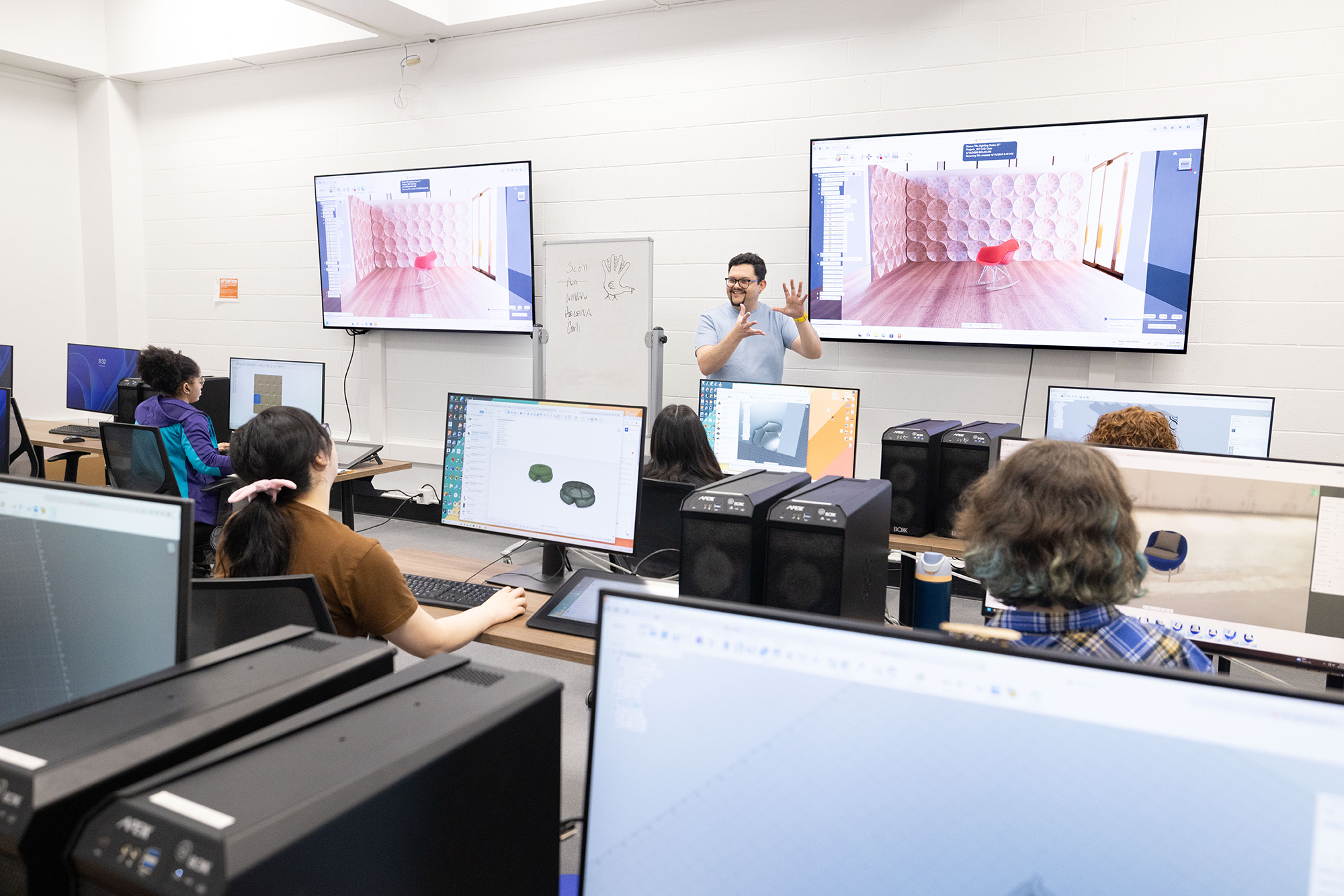Juan Noguera teaches in a computer lab.