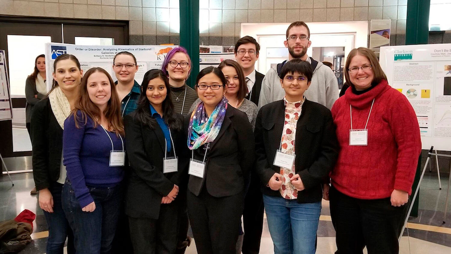 a group of eleven researchers poses for a photo.