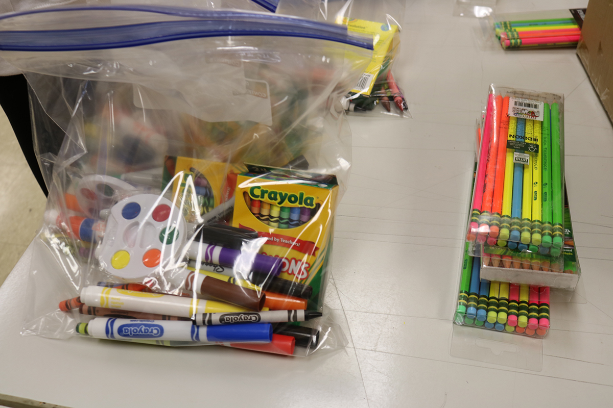 A bag full of art supplies as part of a community outreach project.