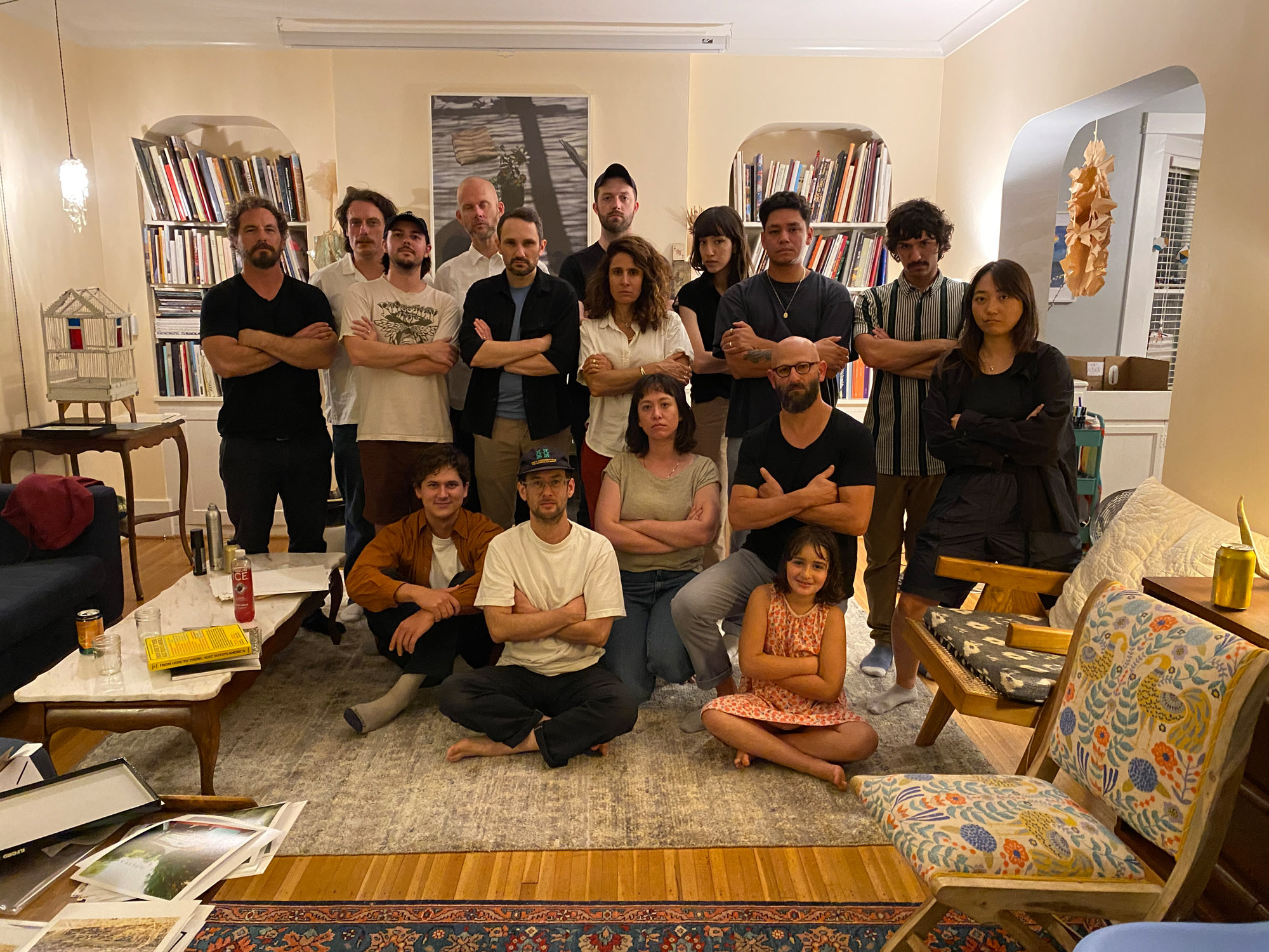 A group of people pose.