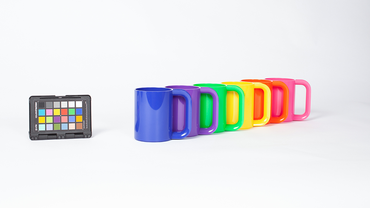 Vignelli-designed mugs of various colors Brookstone shopping bags for the Vignelli digital image archive.