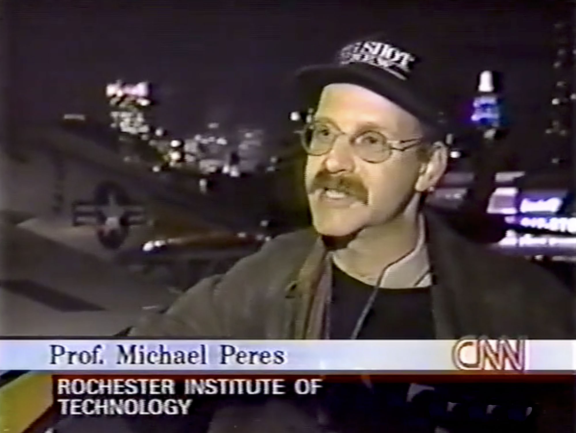 Screenshot of Michael Peres on CNN from 1999.