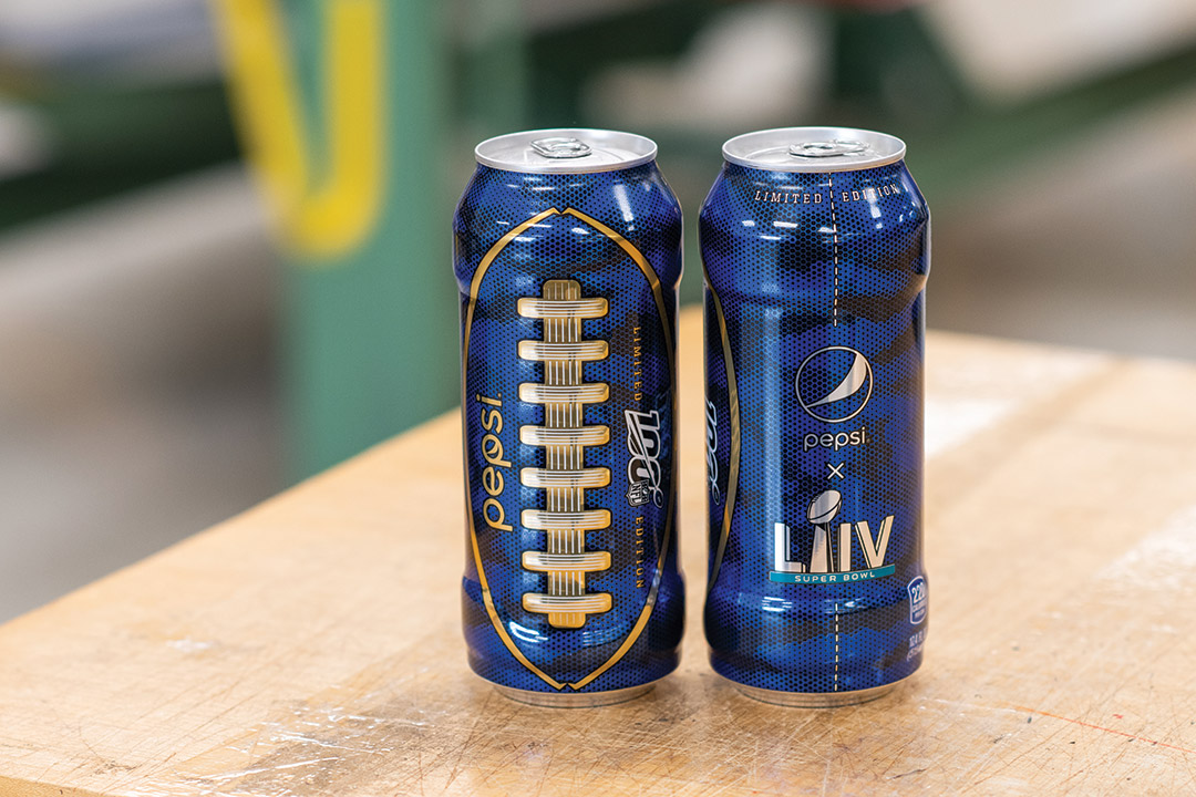 two special edition Pepsi cans with football laces.