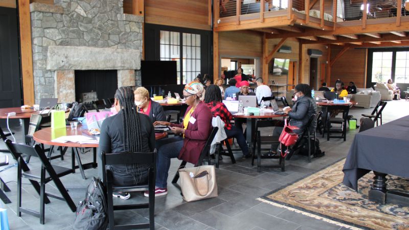 a photo of participants inside the tait preserve working at tables