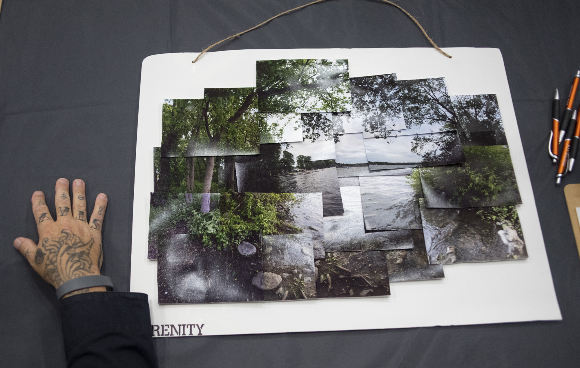Nature photography sits on a table during RIT's NPD event.