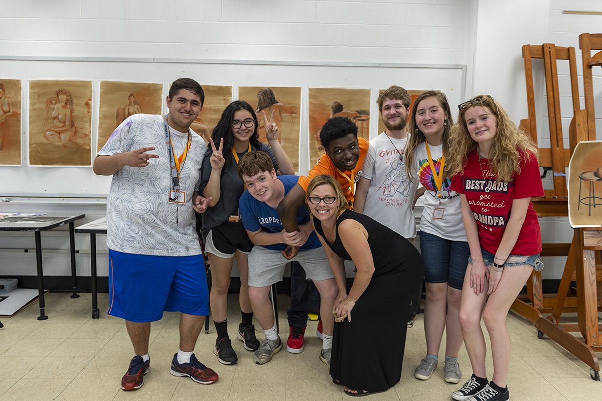 Students and instructors pose for a photo