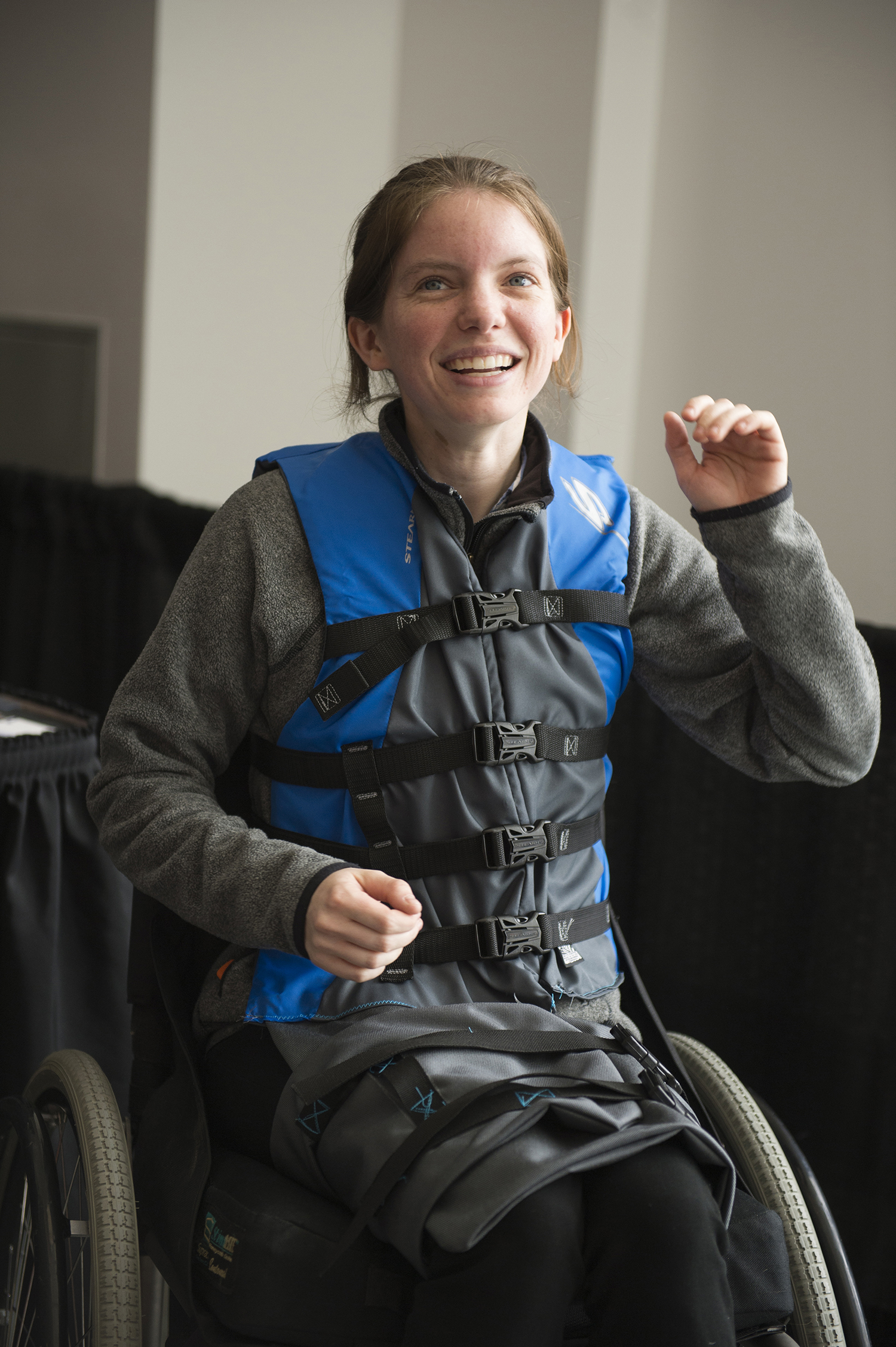 Ana Sorensen models the harness that is part of the transfer system.