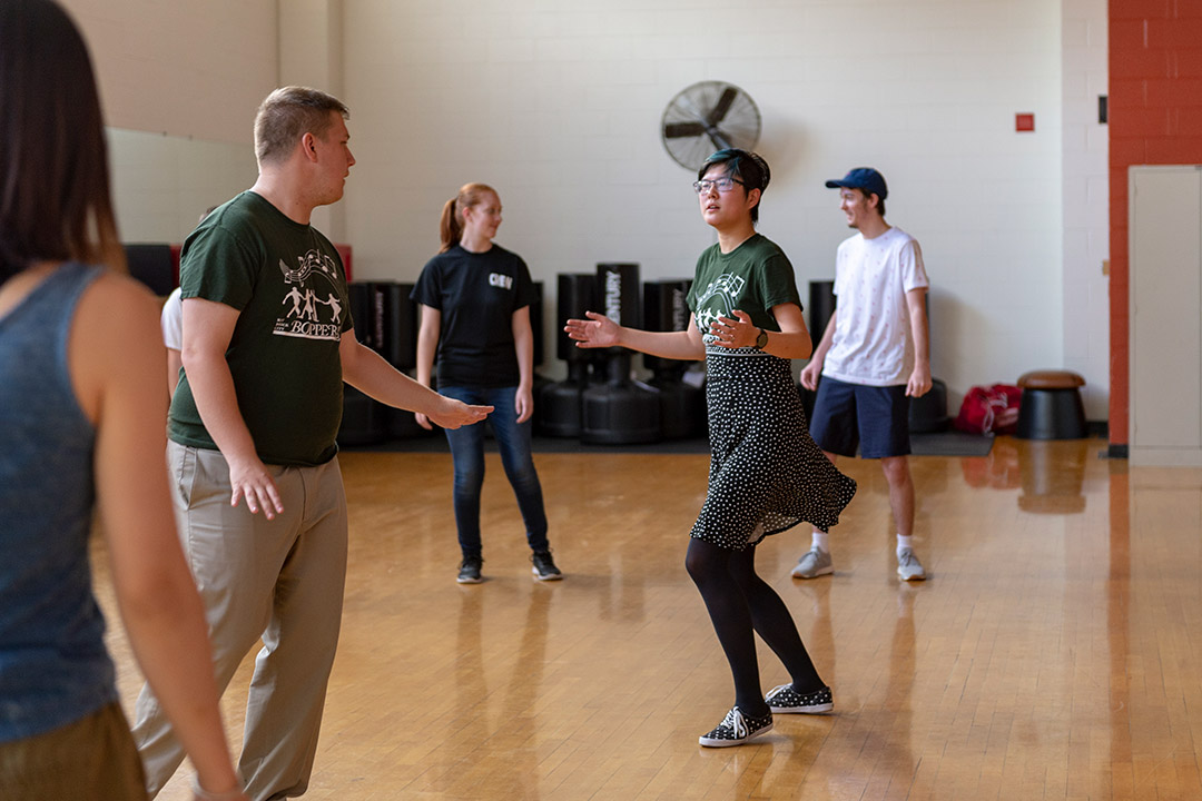 Students swing dance.