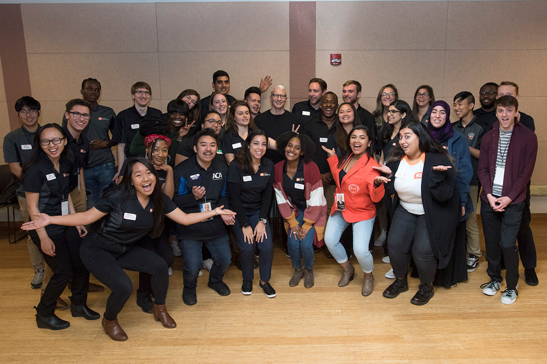 Anderson Cooper and large group of students.