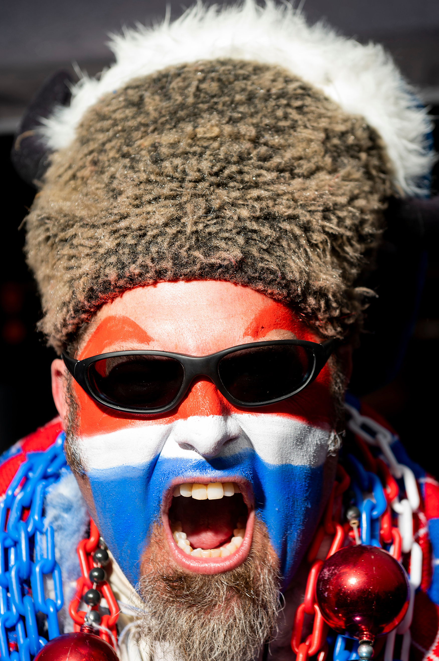 A bills fan with their face painted.