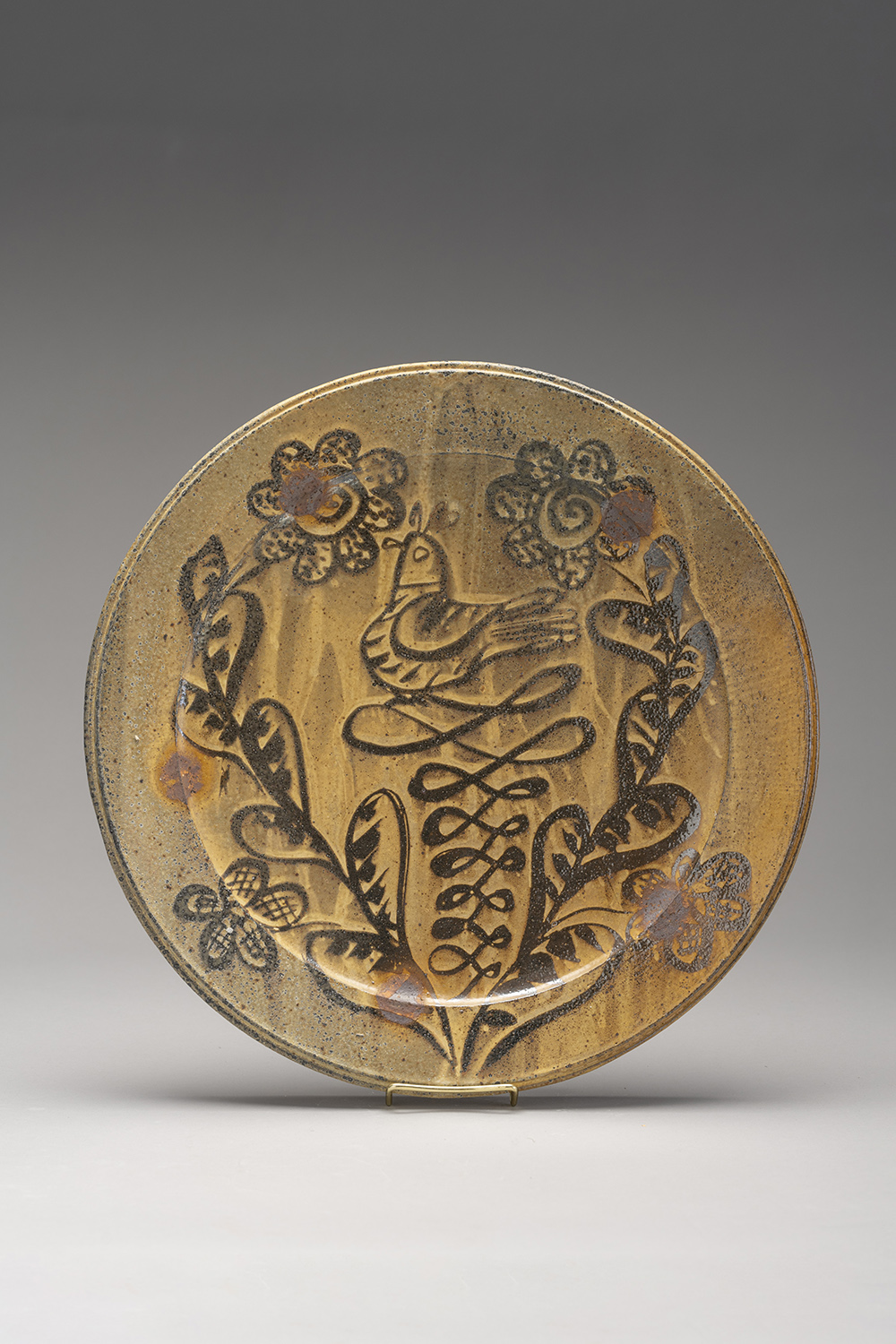 A gold ceramic platter.
