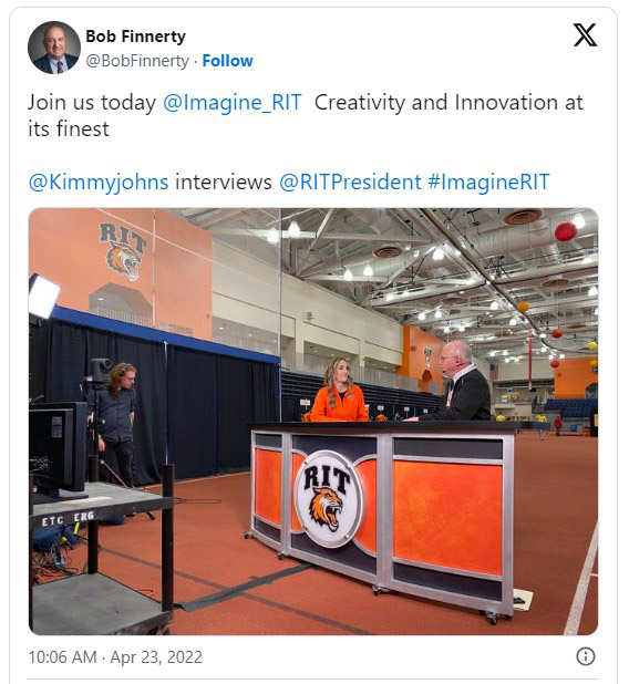 Tweet from Bob Finnerty on April 23, 20 22, with a photo of a make shift news desk and the text, Join us today at Imagine R I T, Creativity and Innovation at its finest. Kimmy Johns interviews R I T President 
