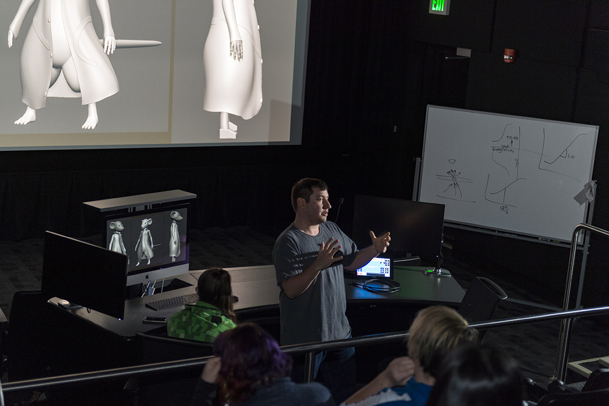 A student demonstrates a project in RIT's state-of-the-art sound-mixing suite.