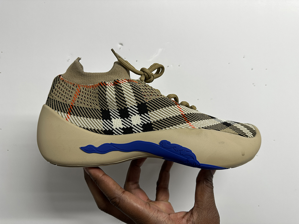 A wool, plaid patterned shoe designed for Burberry by RIT industrial design alumnus Randall Yarborough.