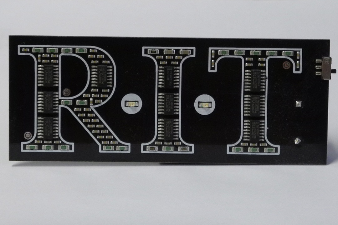 circuitboard that spells out RIT.