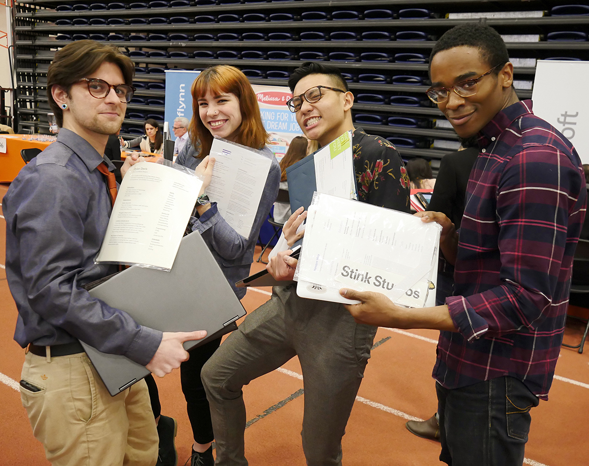 Students show off their resumes and portfolios at Creative Industry