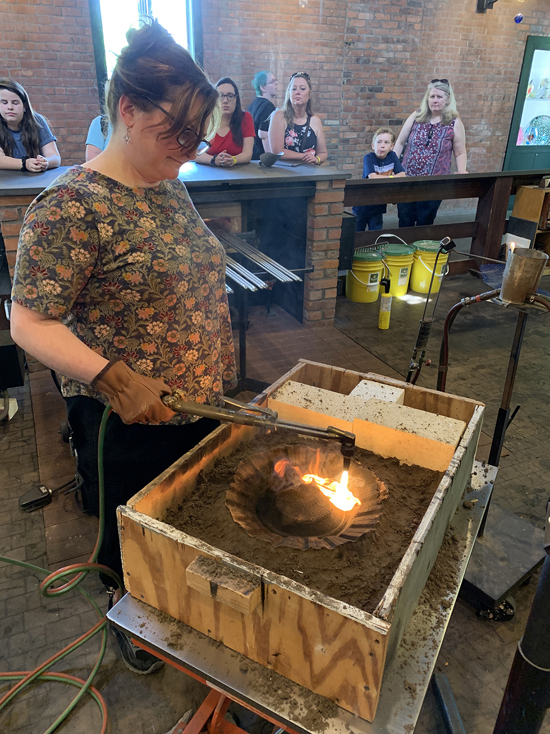 Robin Cass works in the Henry Ford Museum's hot shop