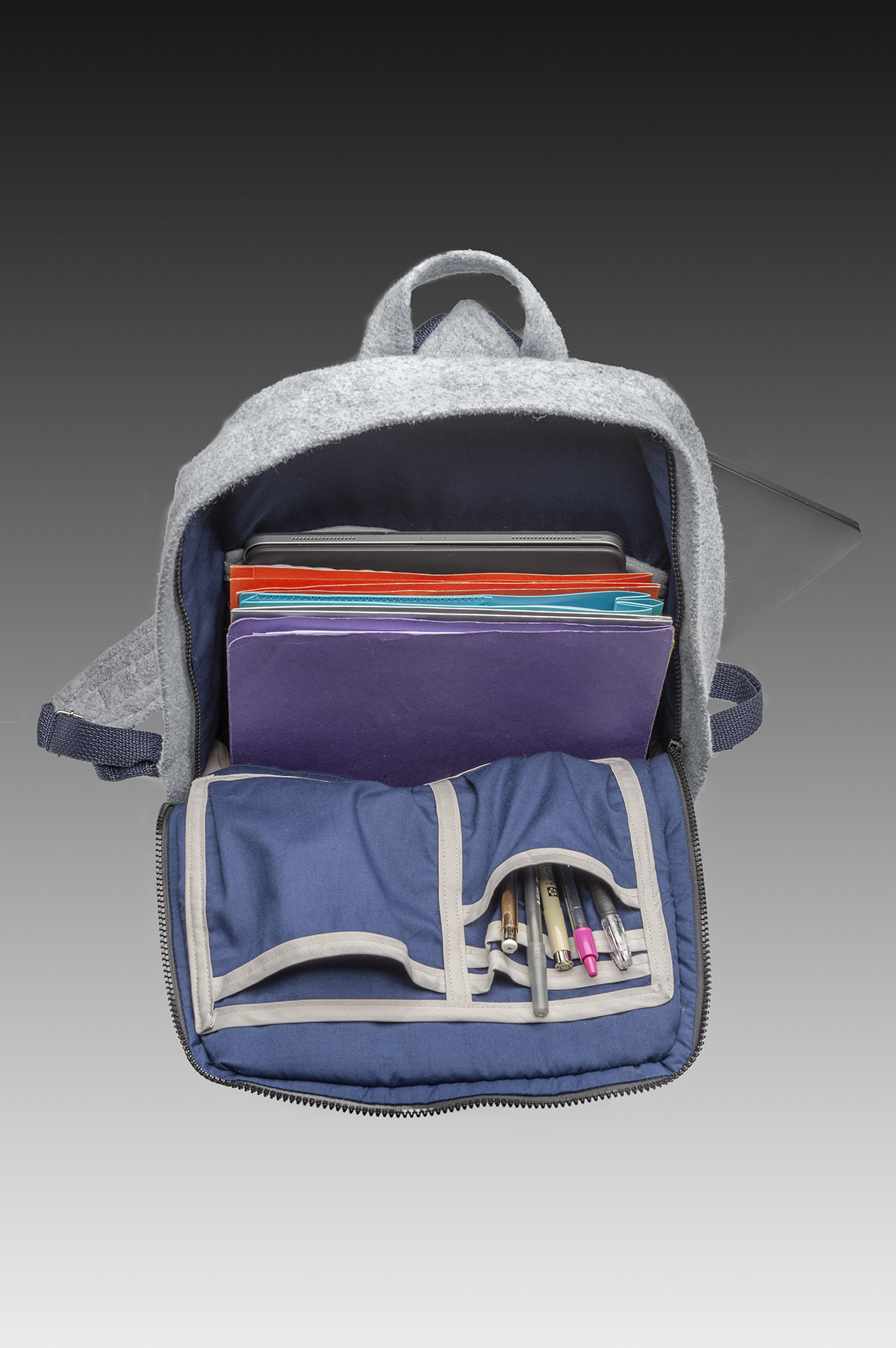 A bag design that holds supplies and a computer. 