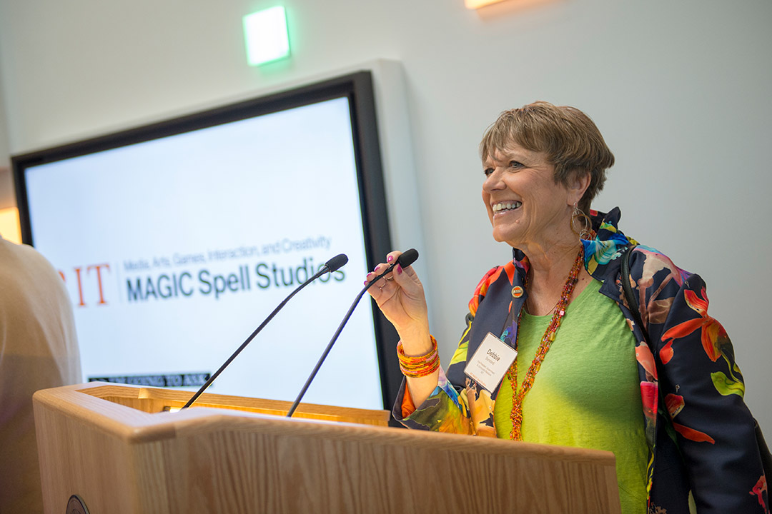 woman speaking at podium