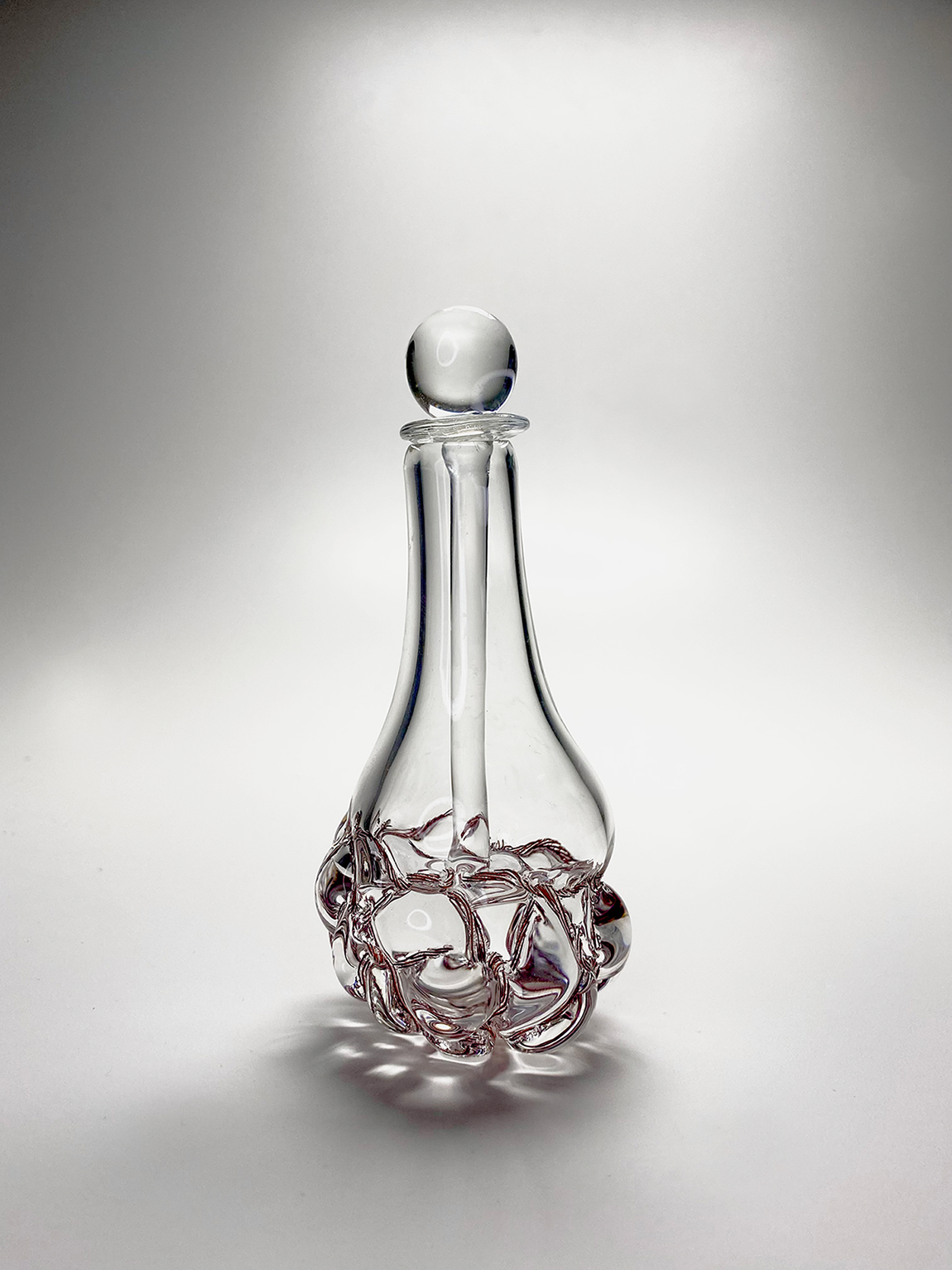 A glass perfume bottle design.