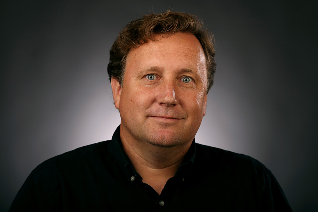 Head-and-shoulders view of man wearing black shirt