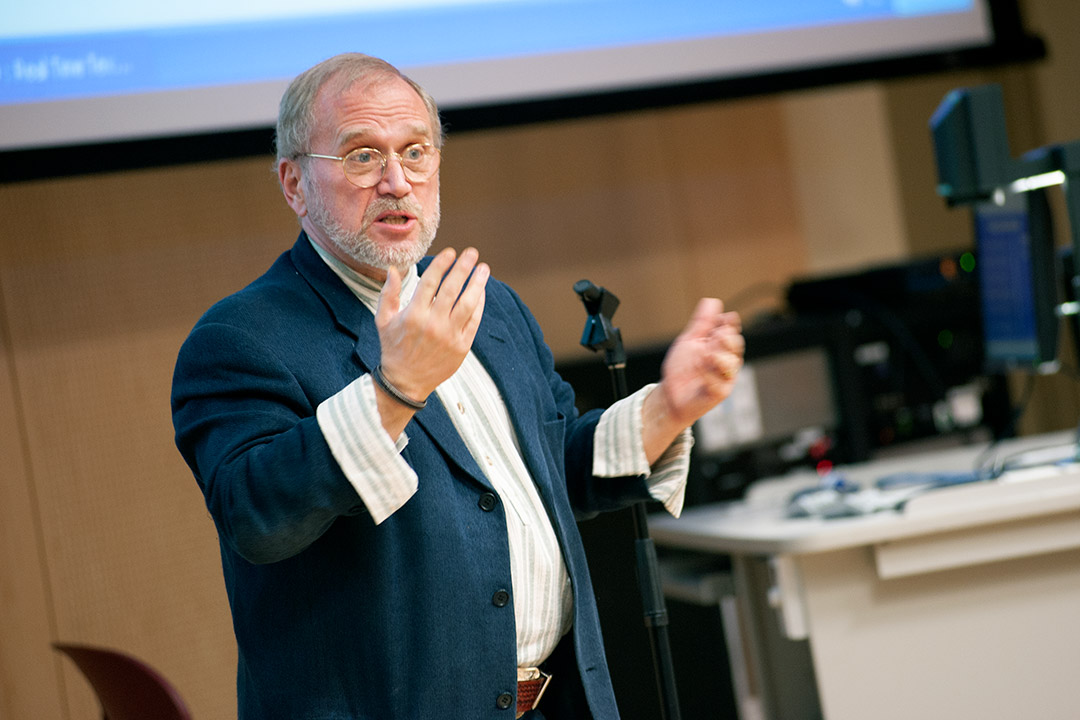 Professor teaching in classroom.