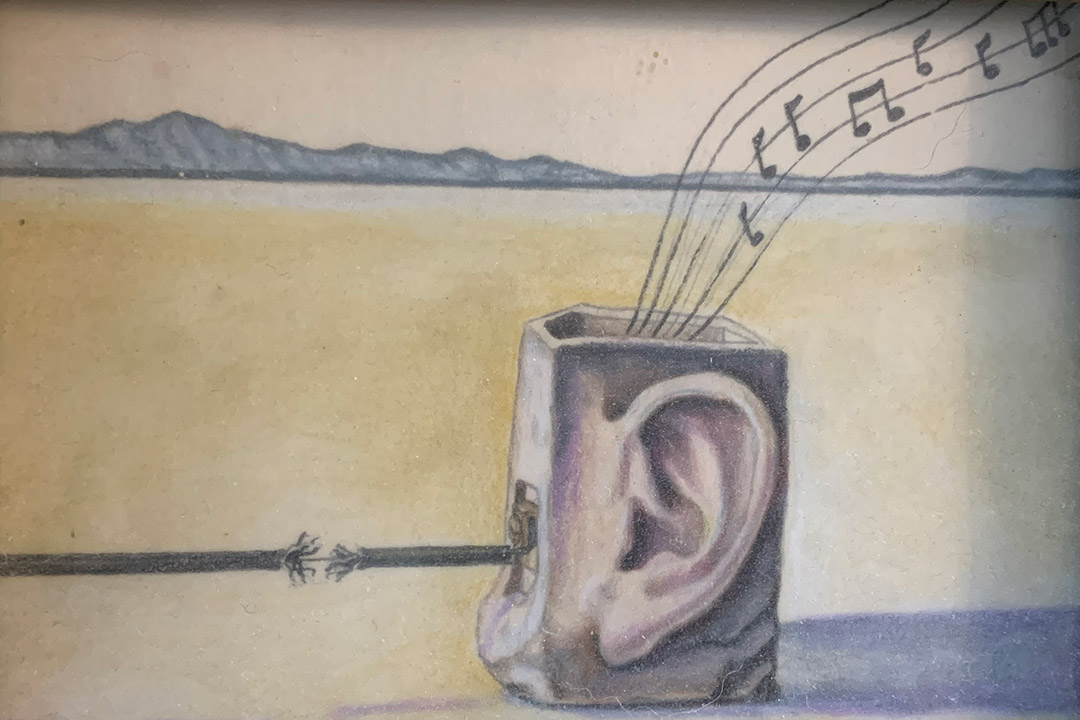 artwork featuring a box with an ear drawn on it. There is a frayed power cord and music notes coming from the box.