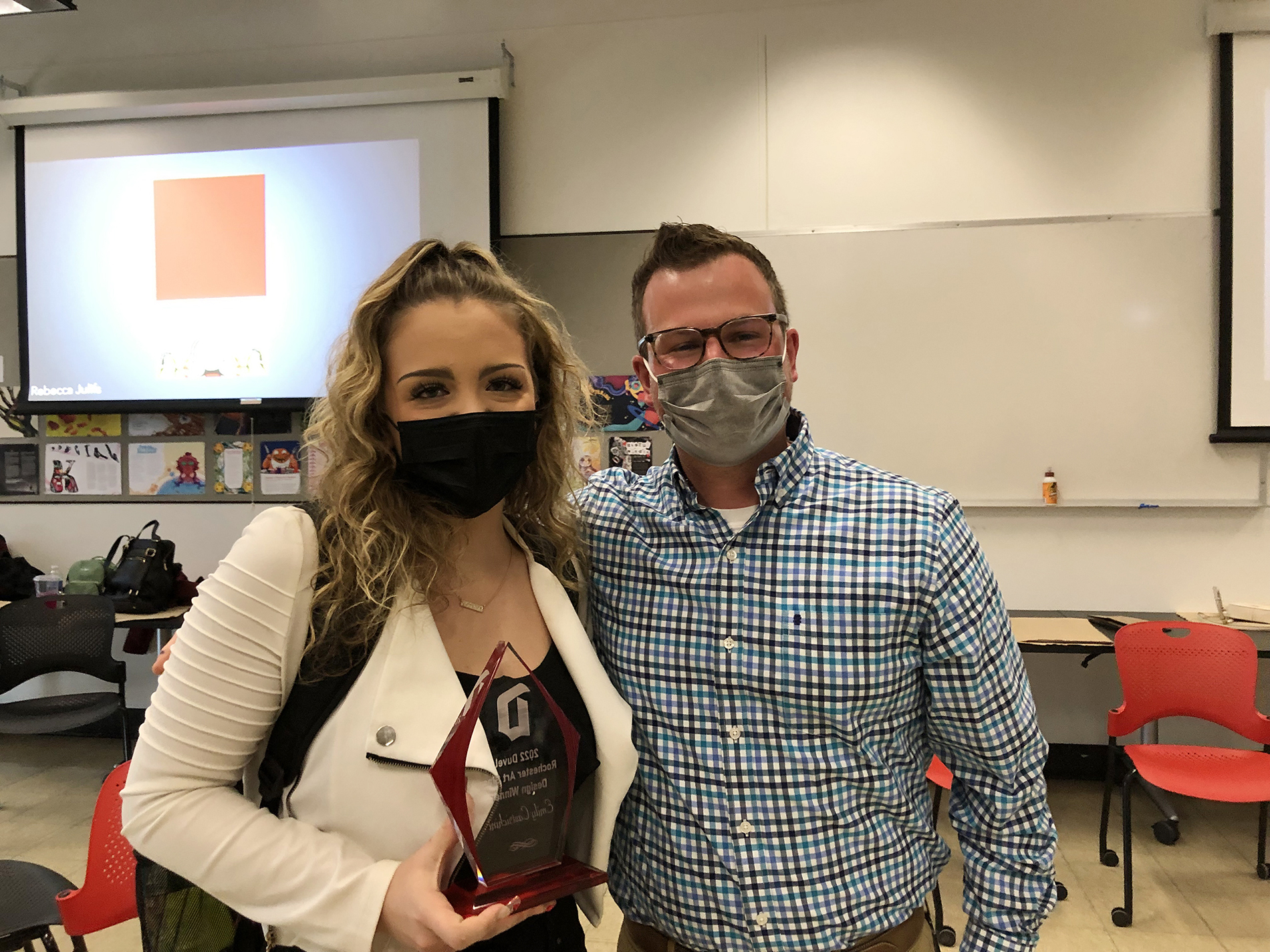 Emily Castrichini and Steve Durso pose for a photo together.