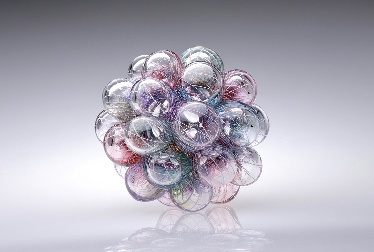 Glass spheres fused together