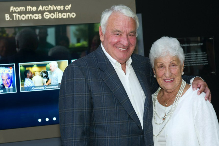 man and woman posing for a photo.