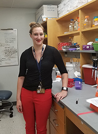 Grace Morales standing in a lab