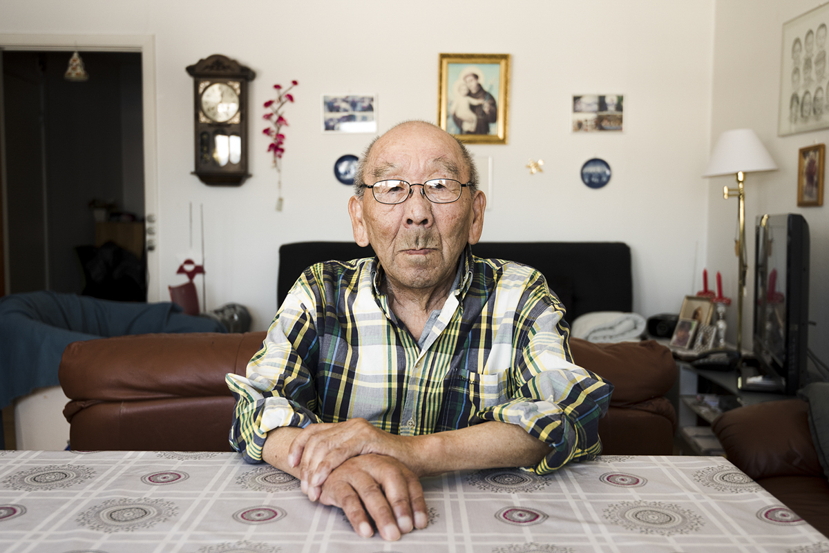 Amos Egede, a radio personality and comedian, at home. The photo was taken as part of Denis Defibaugh's NSF grant.