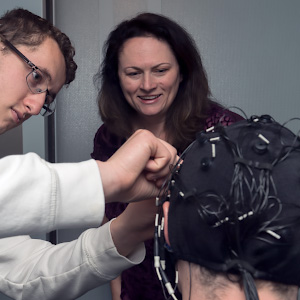 student and professor working with neuroscience participant