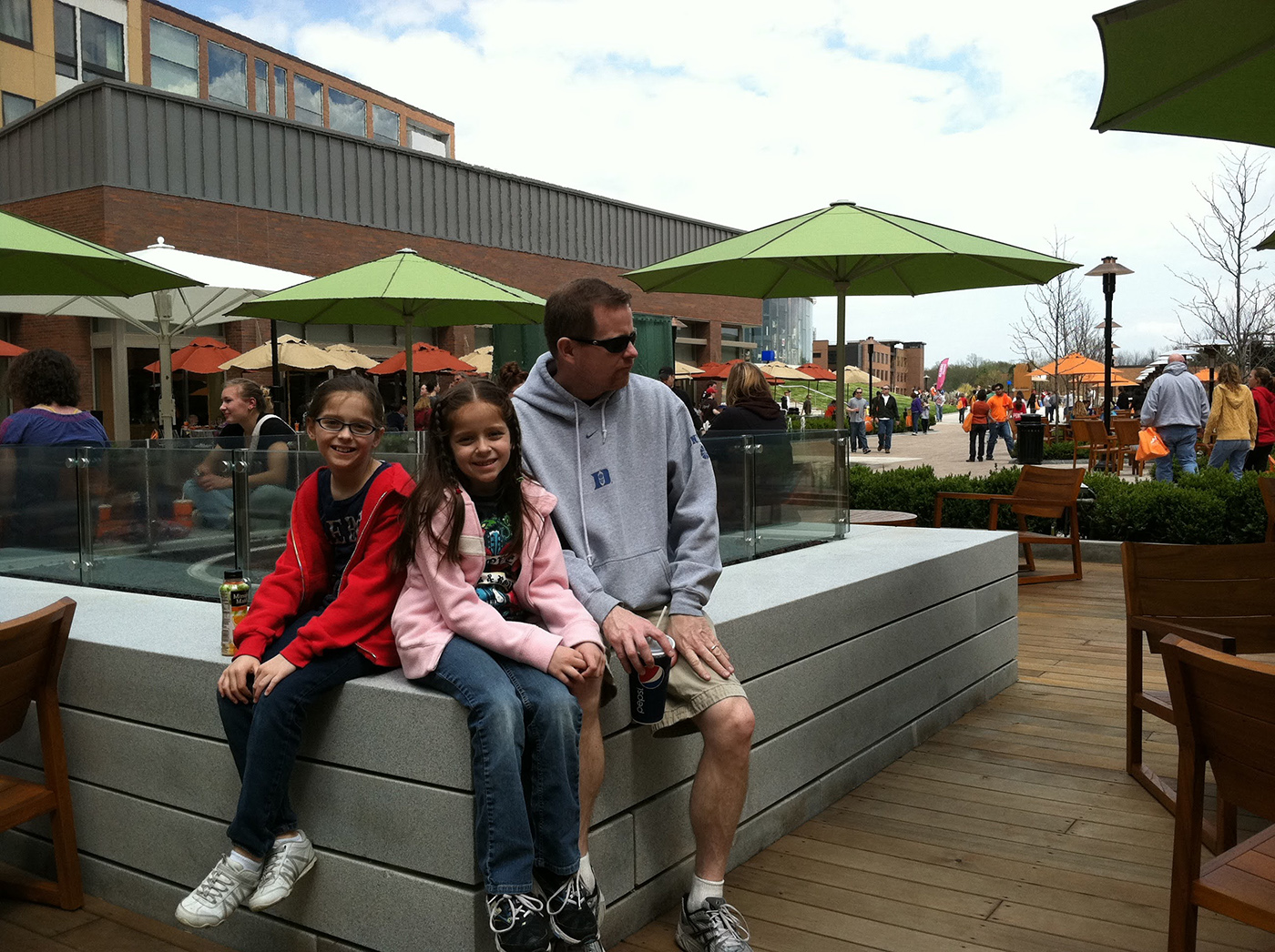 A young JamieLynn Gallagher at Imagine RIT with her father and sister.