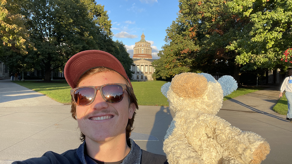 Colin O'Brien holds a stuffed animal.