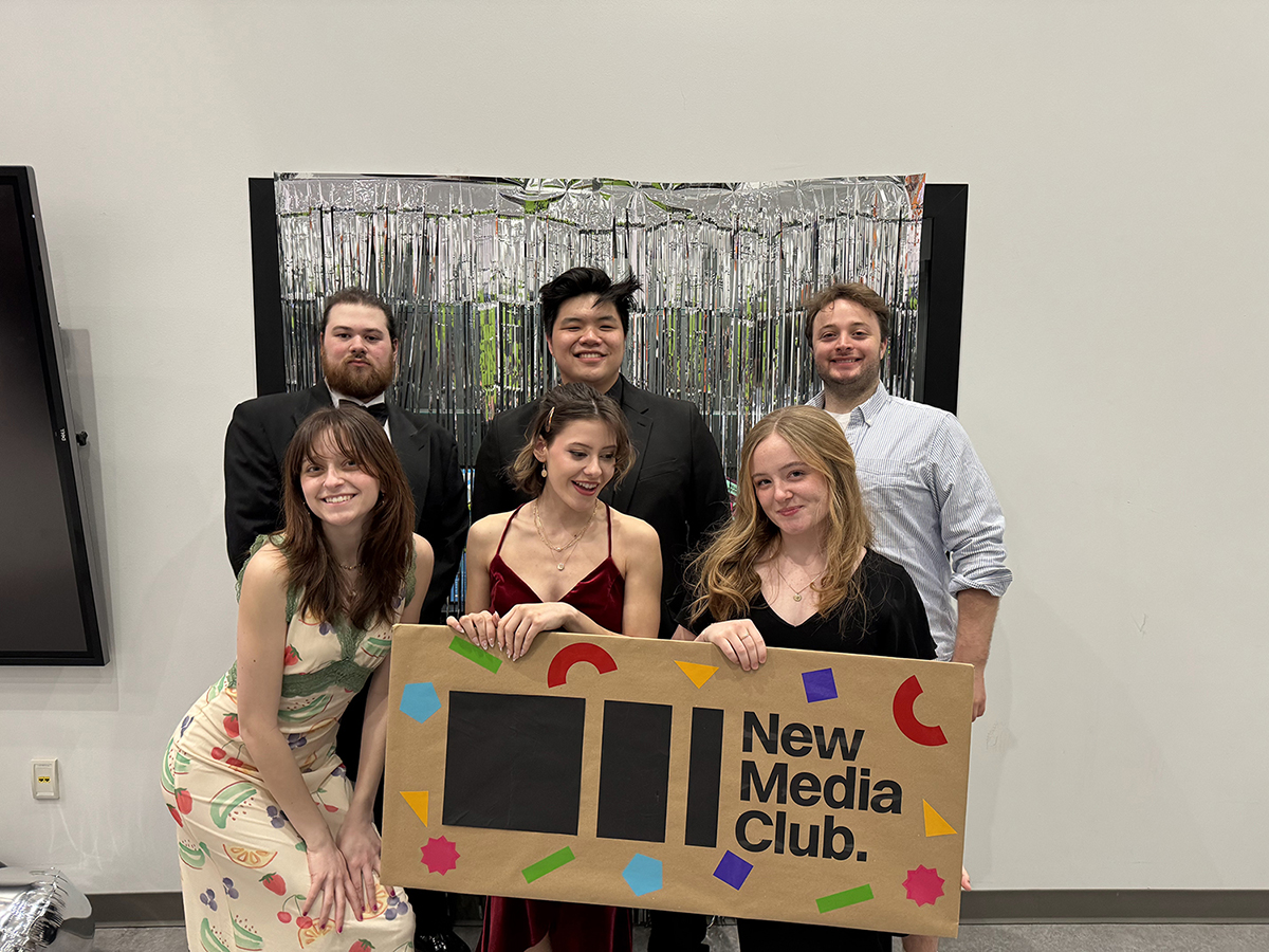 A group of students dressed formally for an event.