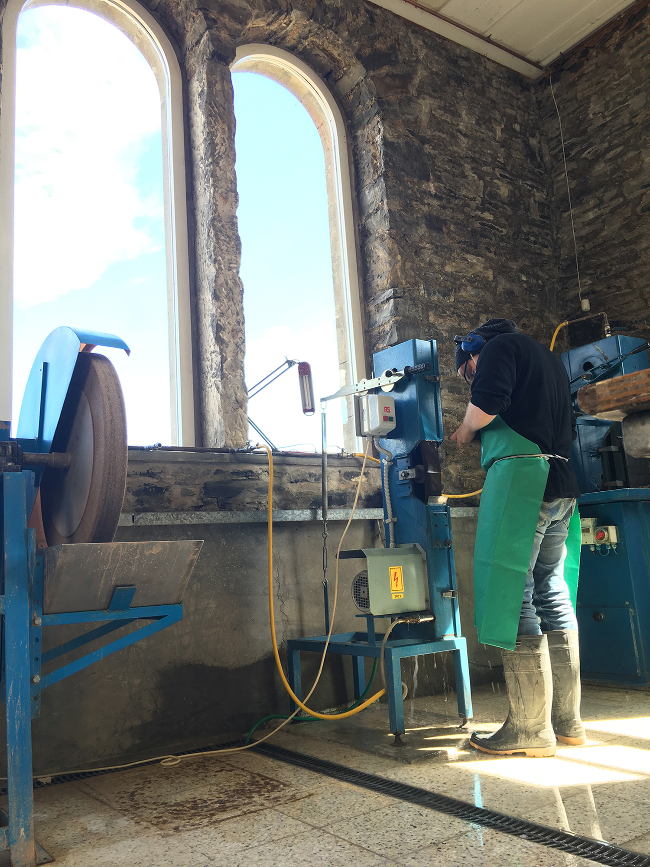 Man at work doing glass things