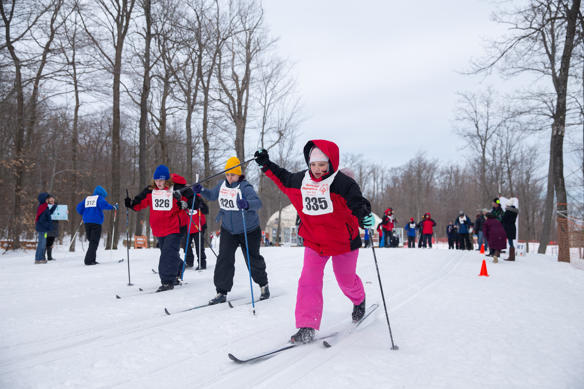 Kyleigh Maslund, right, Tara Sayward, middle, and Kaitlyn Dunlap, left, race during the cross country competition.  