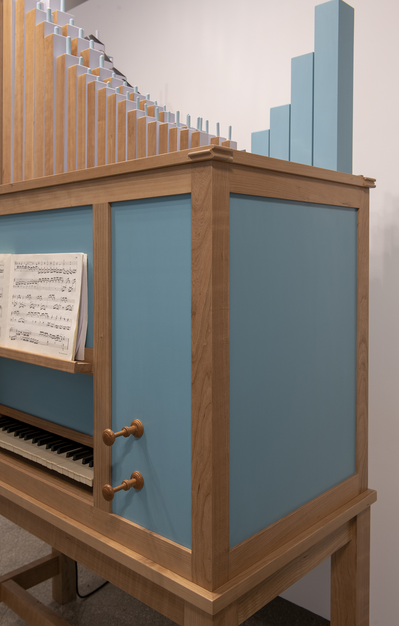 A detailed photo of a handmade pipe organ.