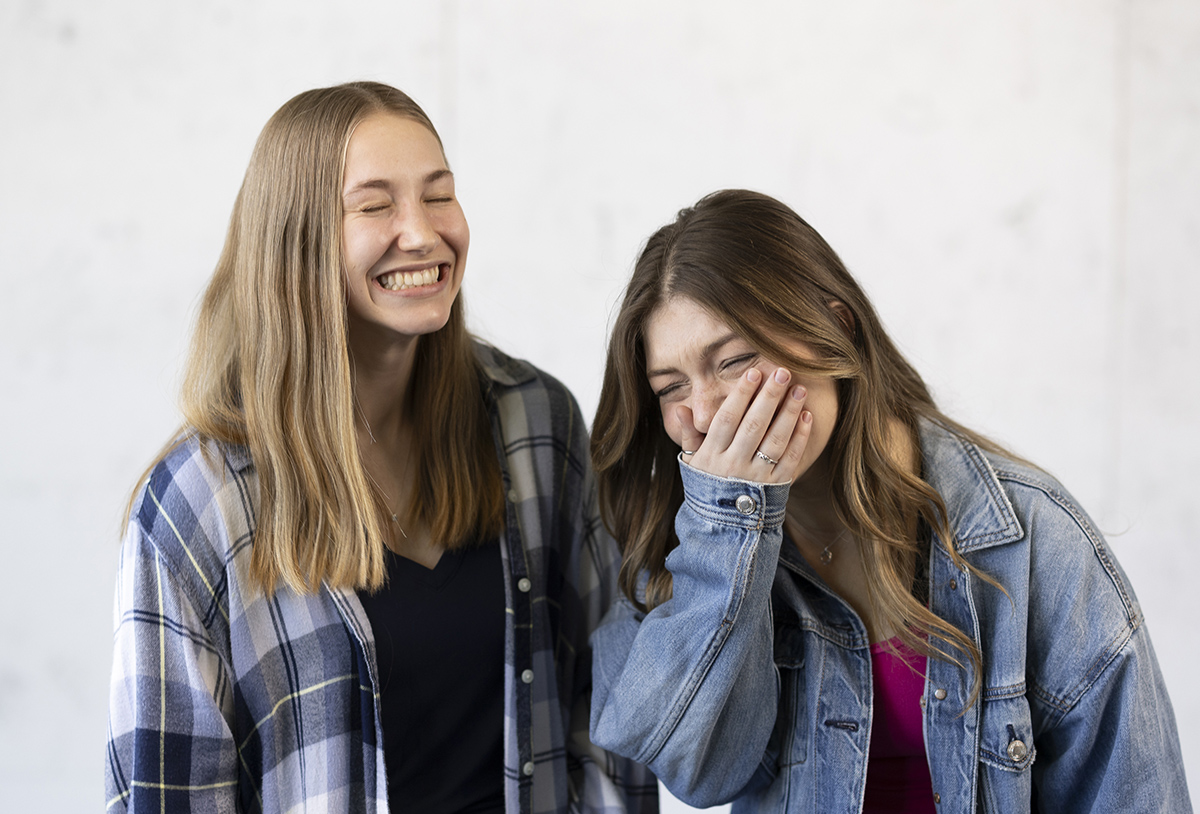 Bari Hayden and Jackie Drozd laugh together.