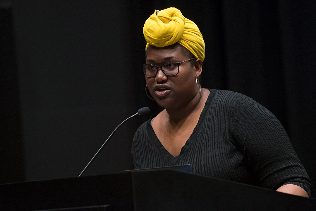 student speaking at podium